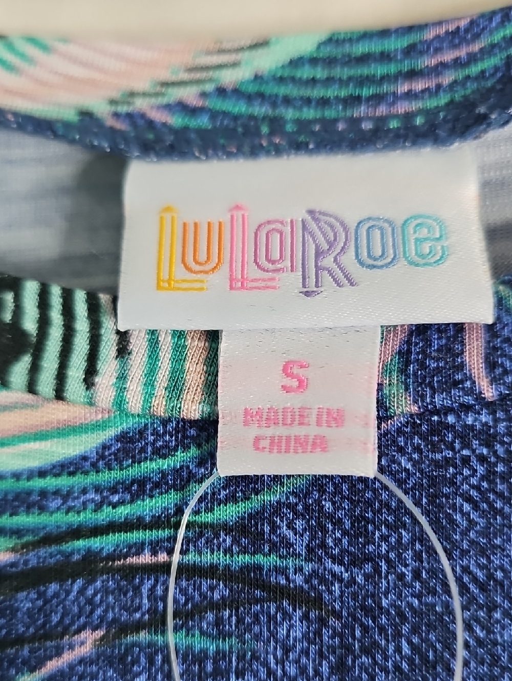 Lularoe Olive Peacock Feather Print Blue Short Sleeve Tee - Picture 4 of 6